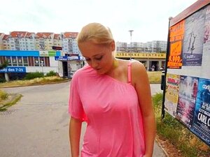 Chubby blonde flashes her huge tits in public for money