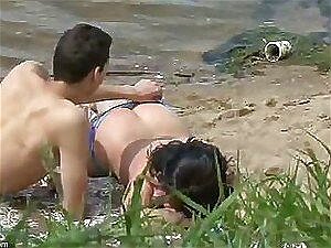 A Voyeur Spots A Cute Couple Fooling Around In The Sand On A Nudist Beach Porn